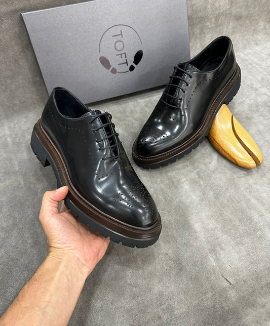 Dana Igwe Black leather EVA sole