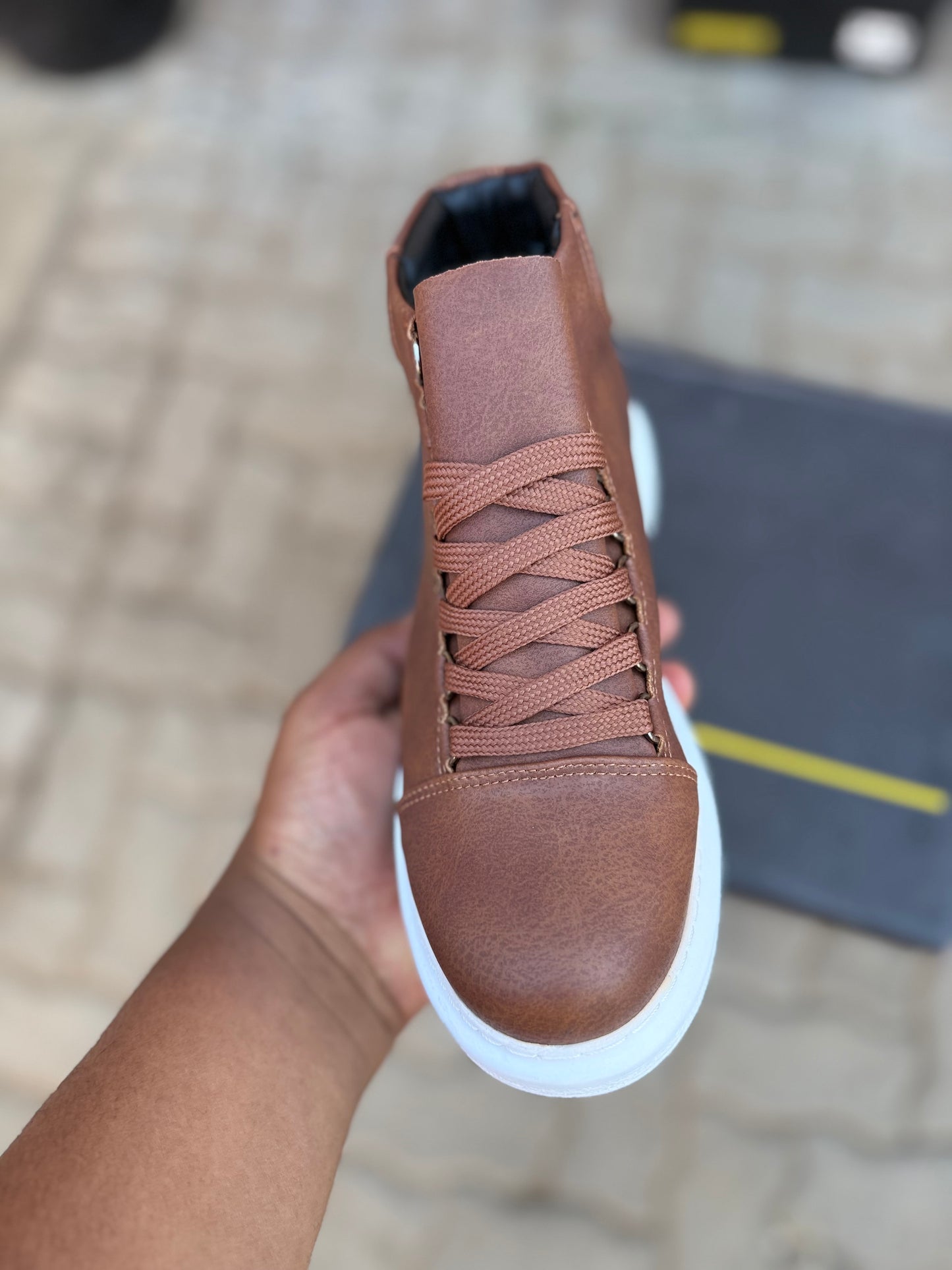 Checkich brown boot with white sole