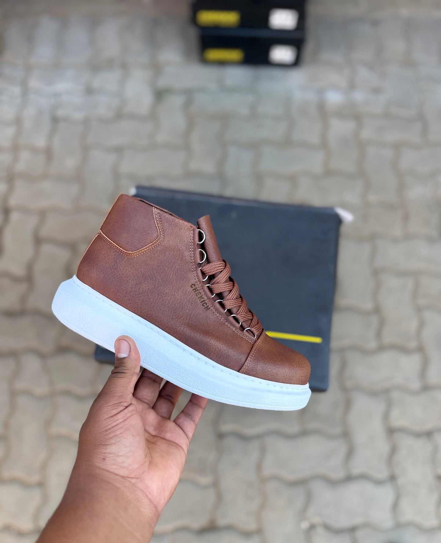 Checkich brown boot with white sole