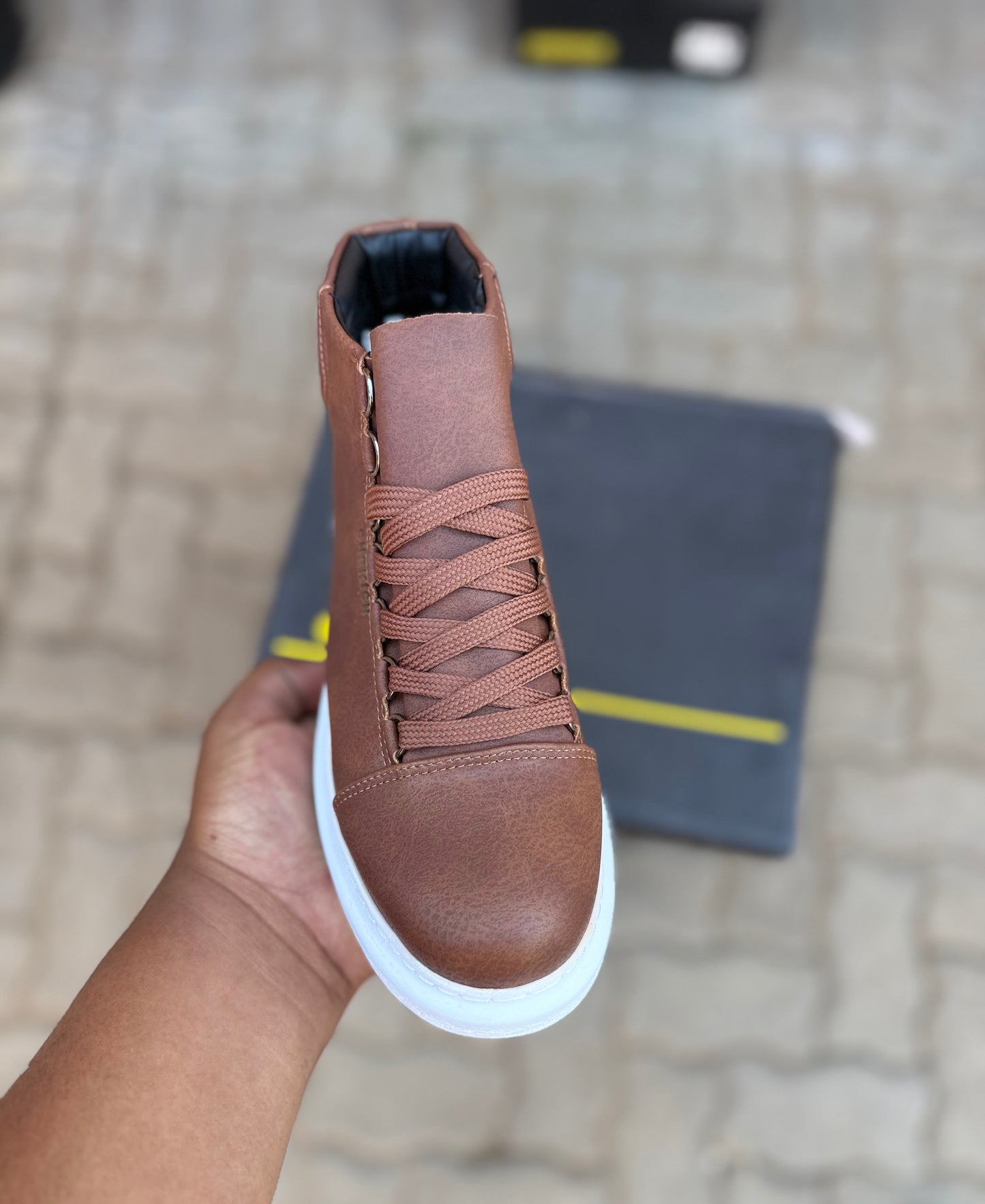 Checkich brown boot with white sole